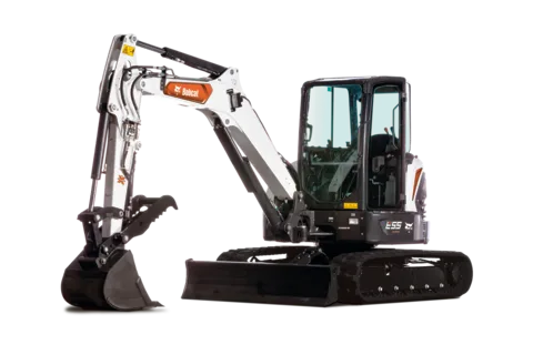 Bobcat E20 compact excavator with bucket extended on job site.